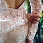 Ivory wedding dress with v-neck cut and open back by Anna Skoblikova