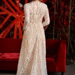 Dense lace wedding dress with long sleeves by Anna Skoblikova