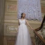 IVANNA – CLASSICAL WEDDING DRESS WITH 3D FLOWERS AND MULTILAYERED TEXTURE MAKES THE BRIDE A FAIRY PRINCESS - Anna Skoblikova