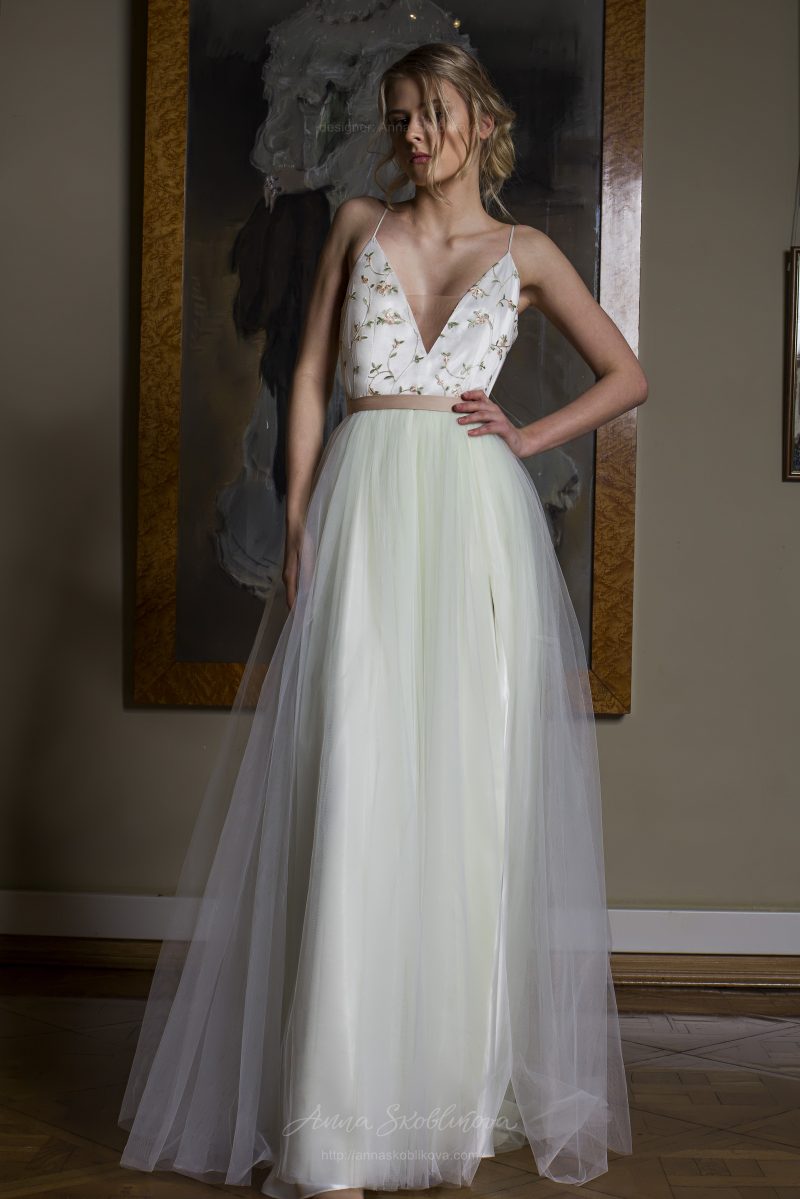 Photo 1: Unique designer wedding dress with a full skirt